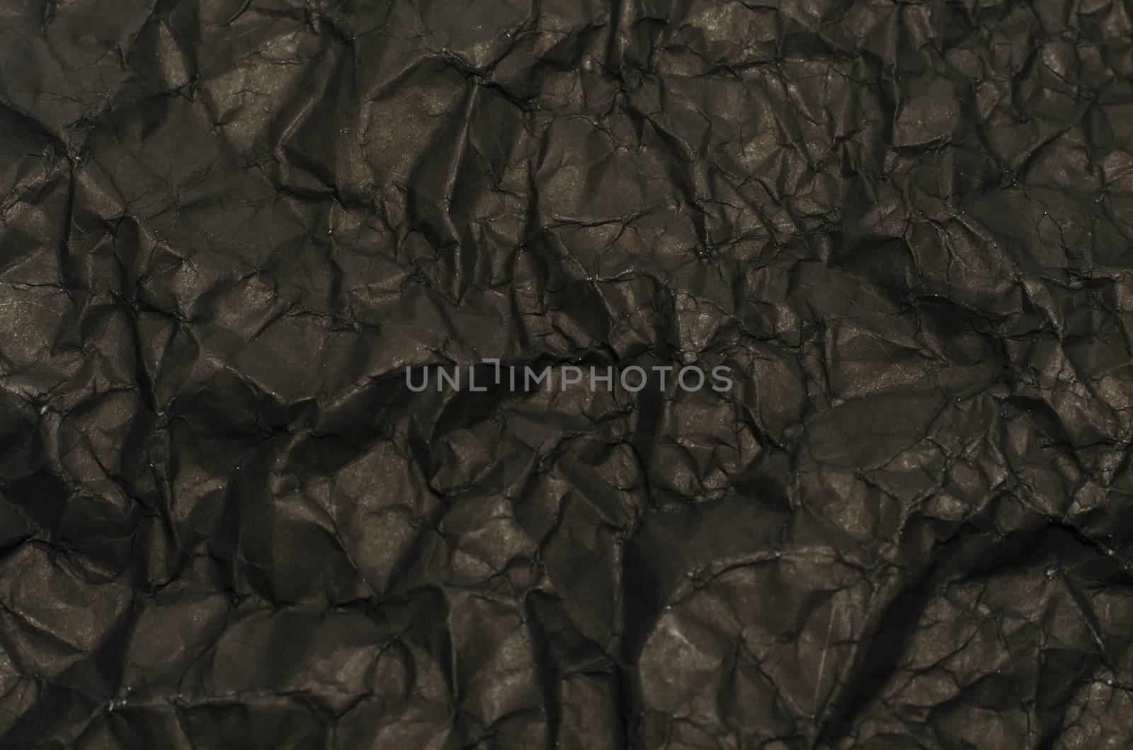 black crumpled paper texture background