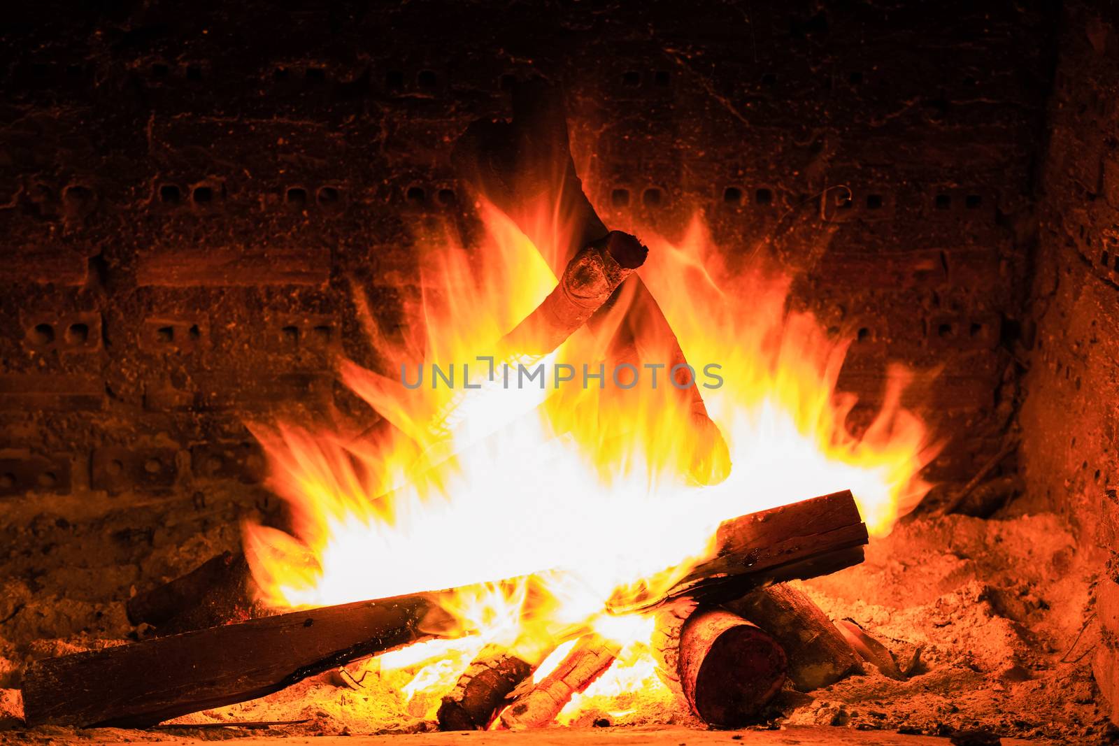 bonfire and flames in a fireplace