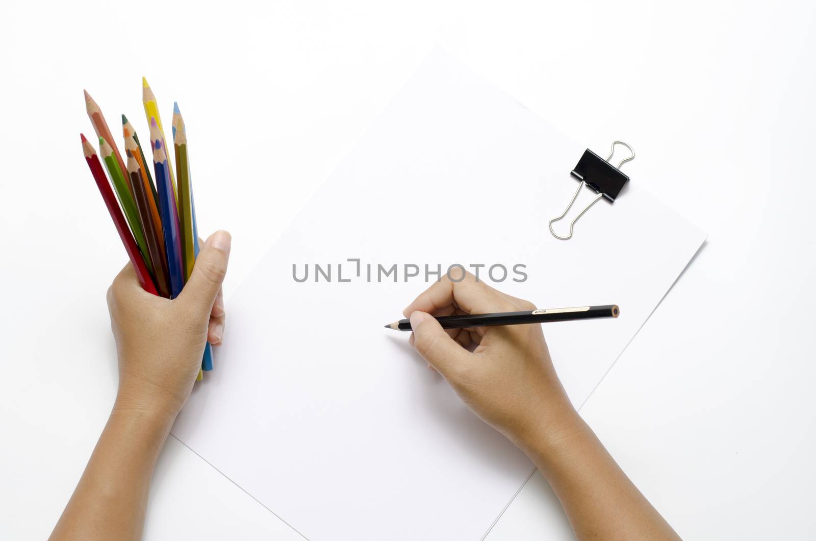 asia woman right hand with black pencil and left hand with colorful pencil on blank white paper over white background