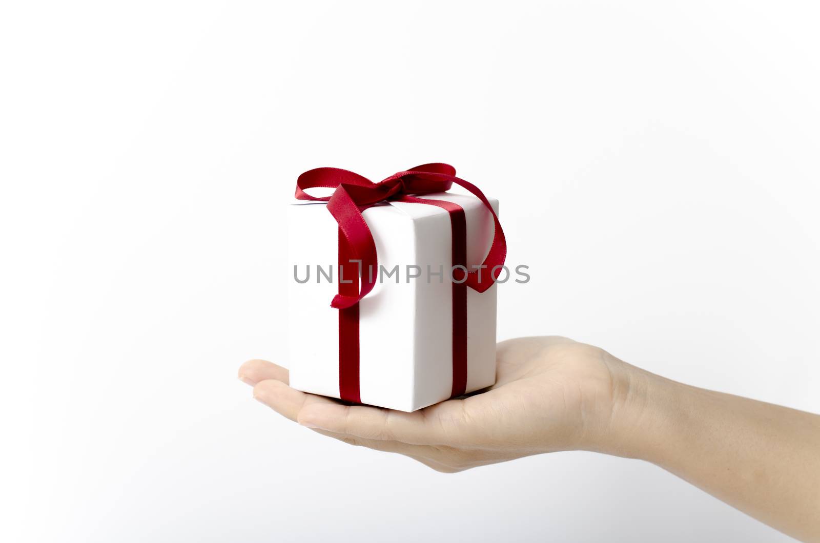 asia woman hand holding gift box on a white background