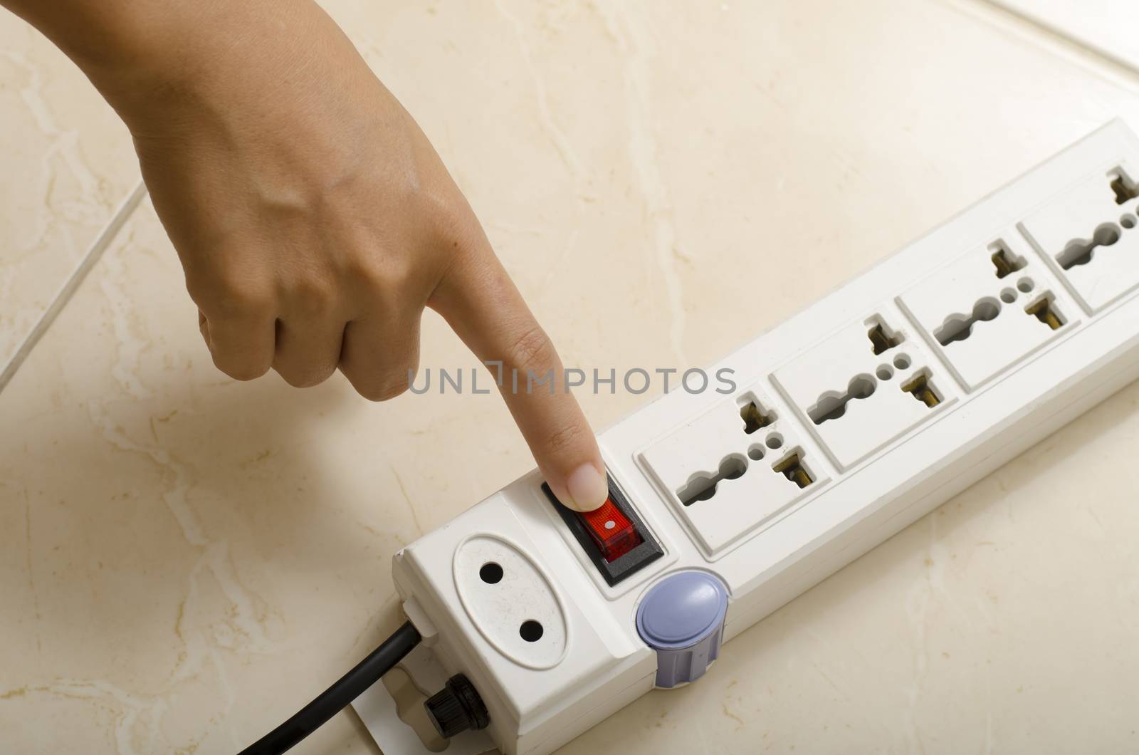 asia woman hand turn on switch multiple  socket plug electric