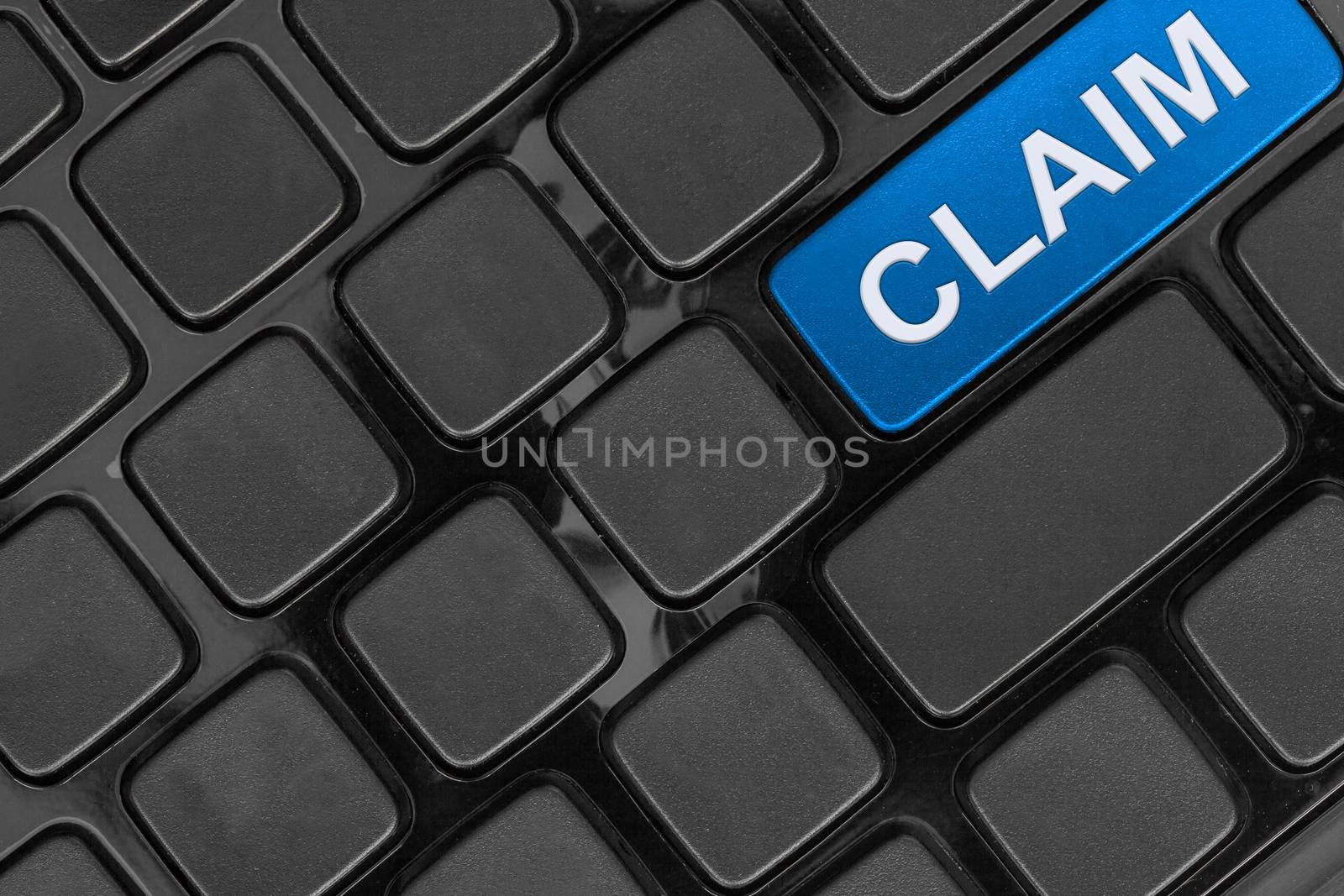 keyboard close up,top view, claim insurance  word