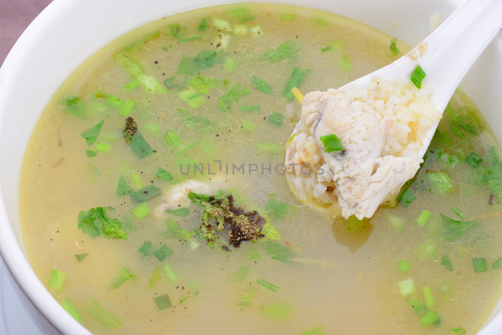 Thai food name is rice porridge with fish