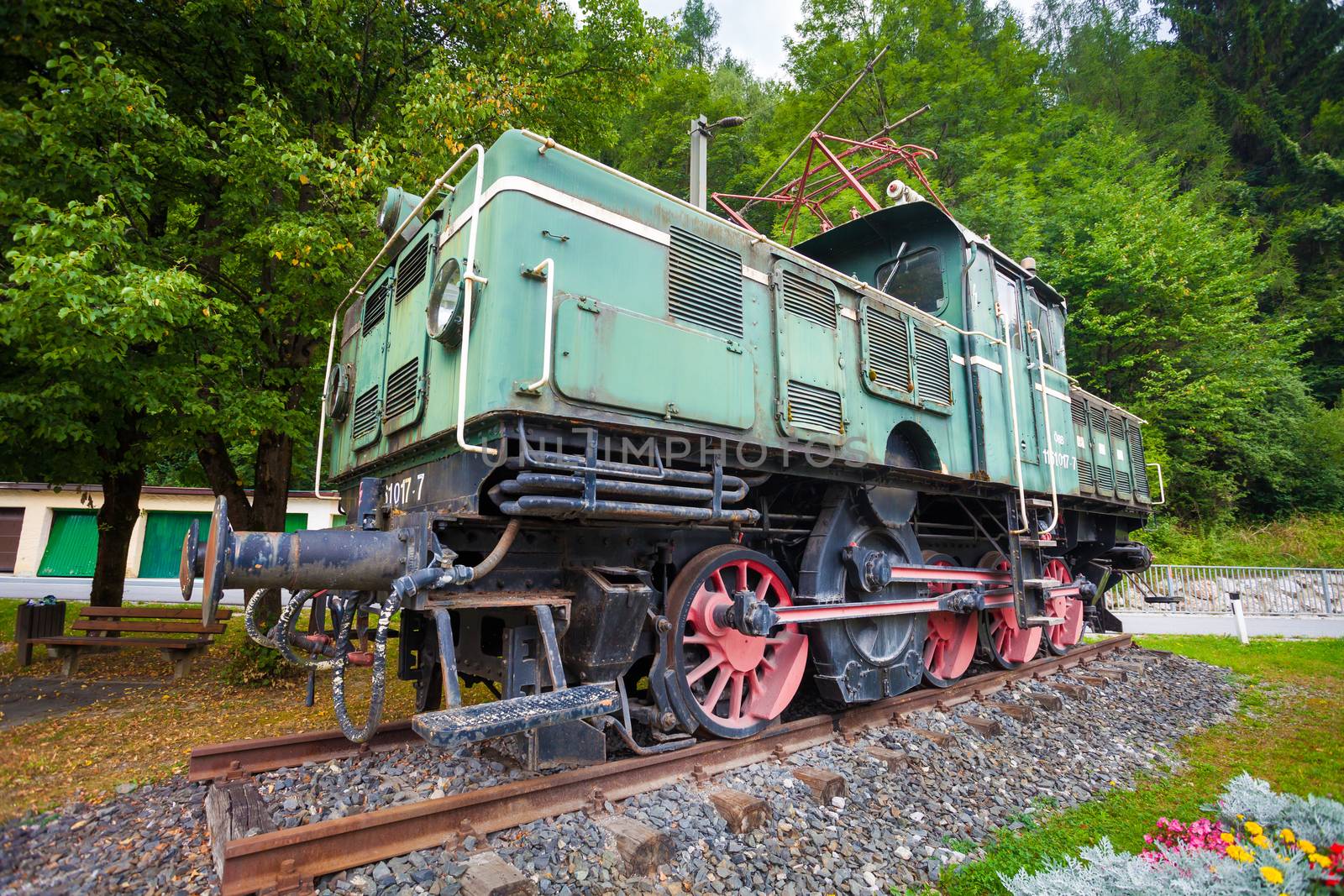 Bischofschofen, Austria - August 8, 2013: Old vintage green electric locomotive, Bischofschofen, Austria