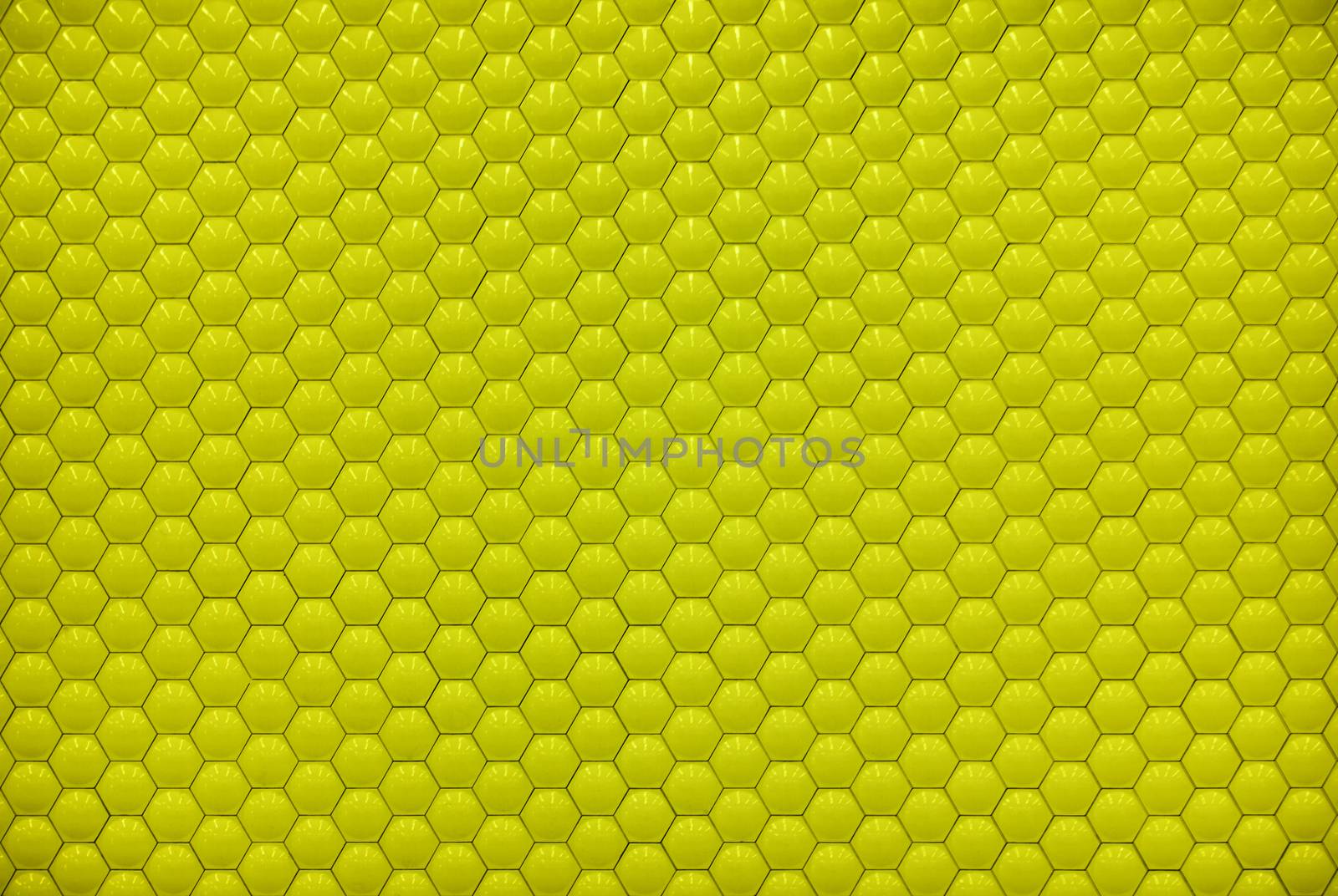 Yellow shiny hexagon bubble tile texture background