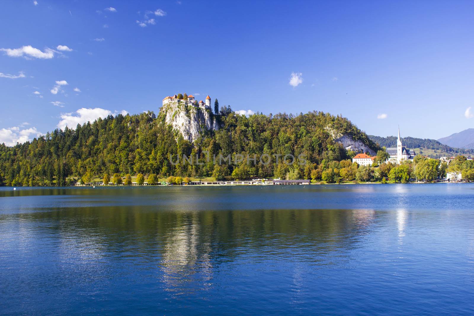 Colorful Bled in fall, with the rock top castle, Slovenia 