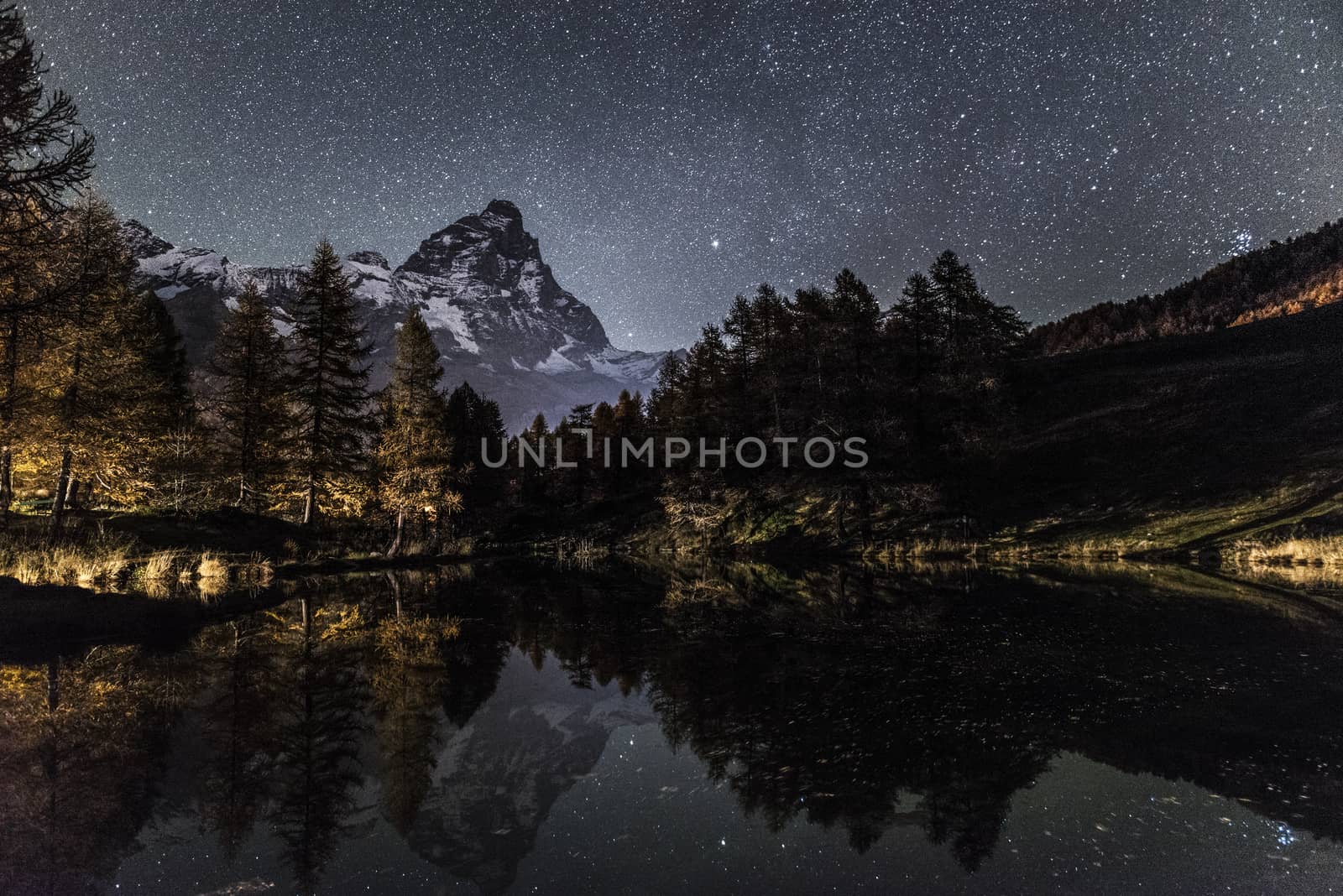 Matterhorn and Blue Lake in an autumn night with starry sky 
