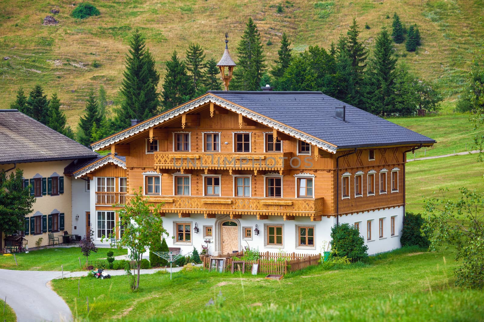 Dienten am Hochkonig, Austria - August 8, 2013: A beautiful typical mountain guests house on austrian alps , Austria