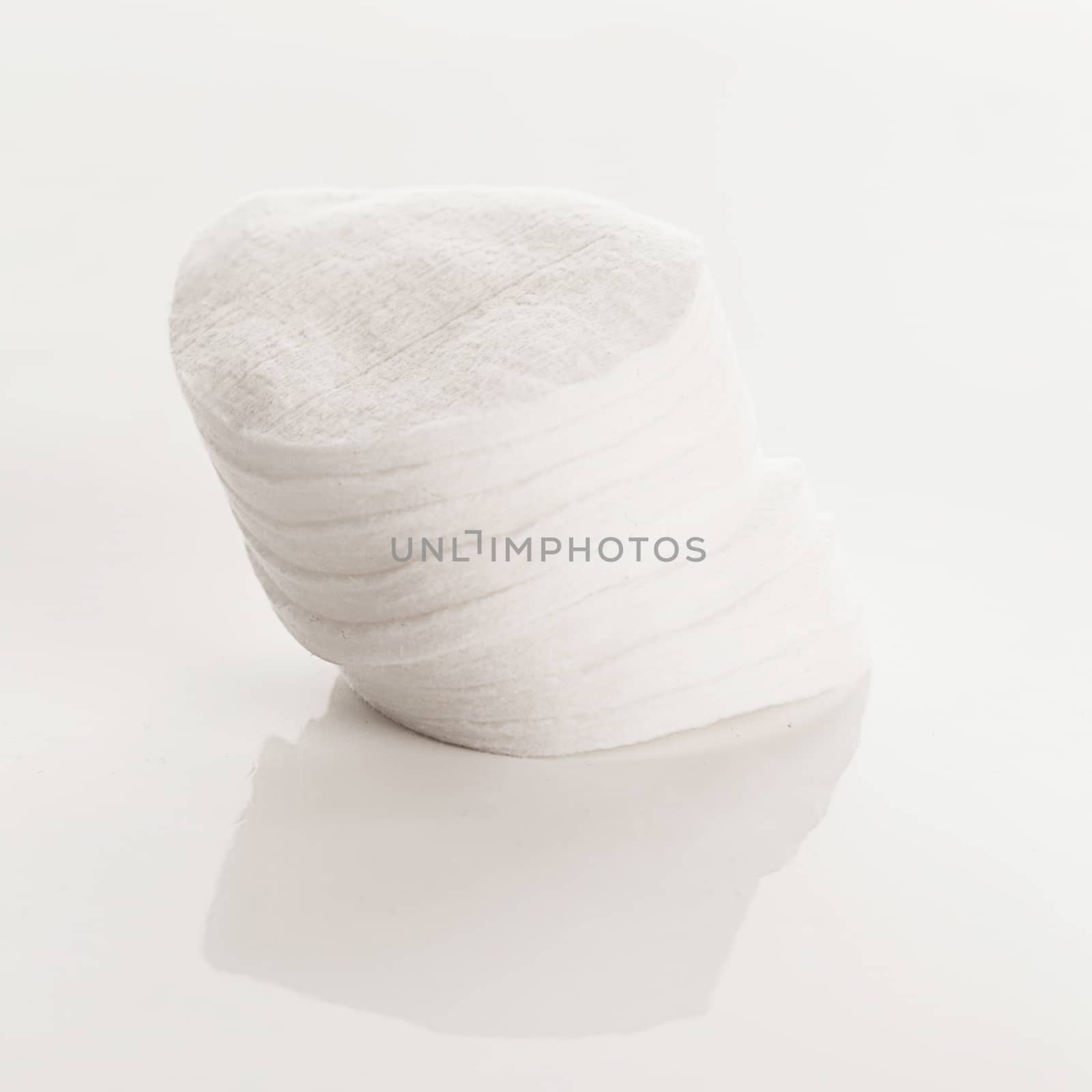 White cotton pads on a white background by rufatjumali