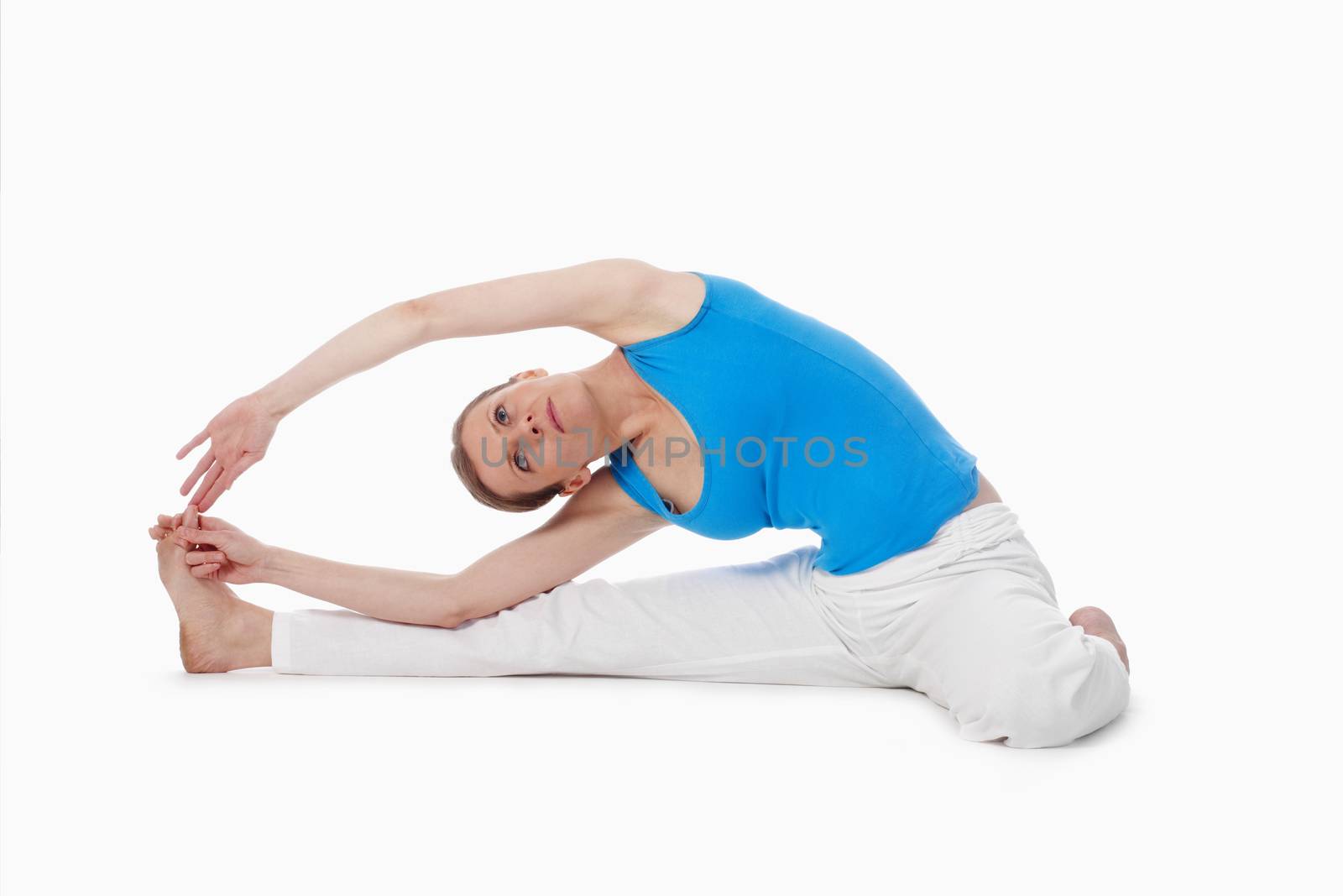 woman exercising hatha yoga - isolated on white