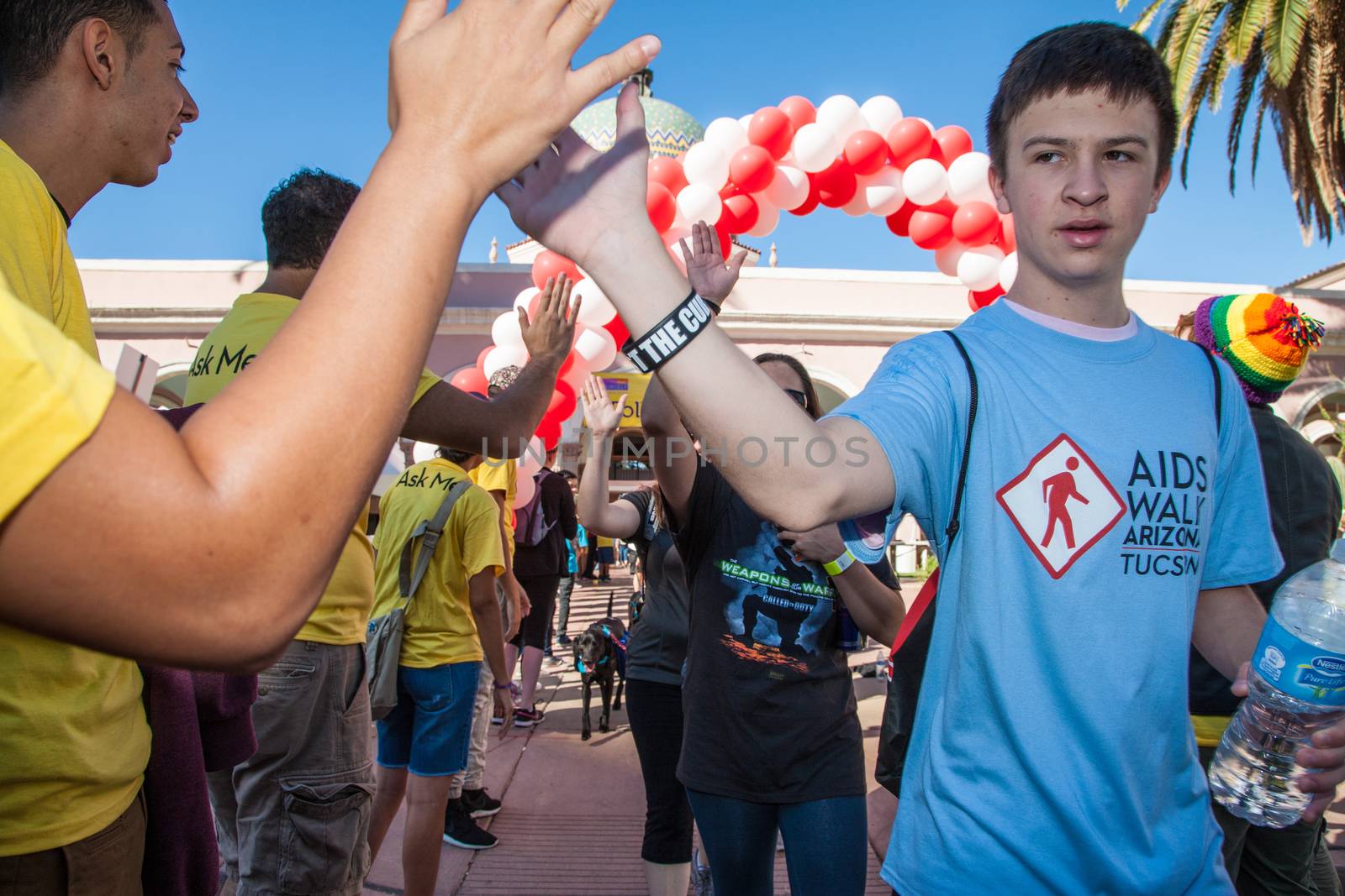 TUCSON, AZ/USA - OCTOBER 12:  Unidentified young man slapping hands on October 12, 2014 in Tucson, Arizona, USA.