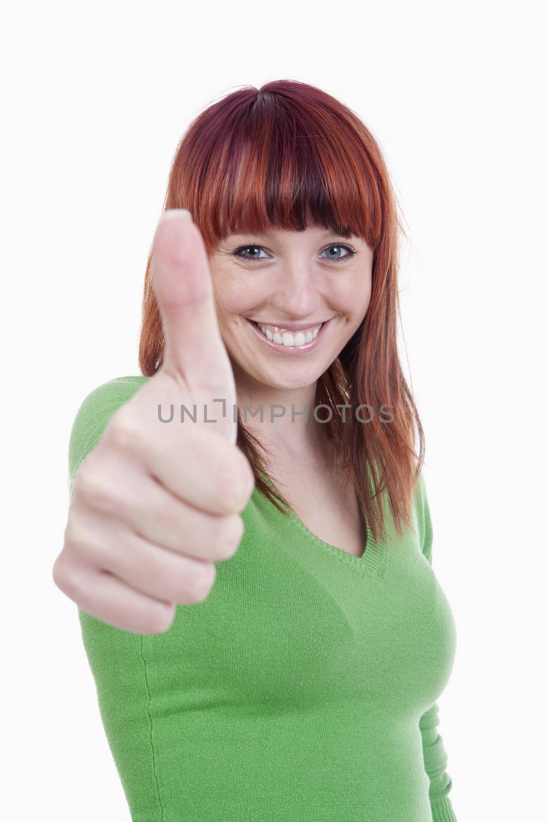 young cheerful woman showing thumbs up sign - isolated on white