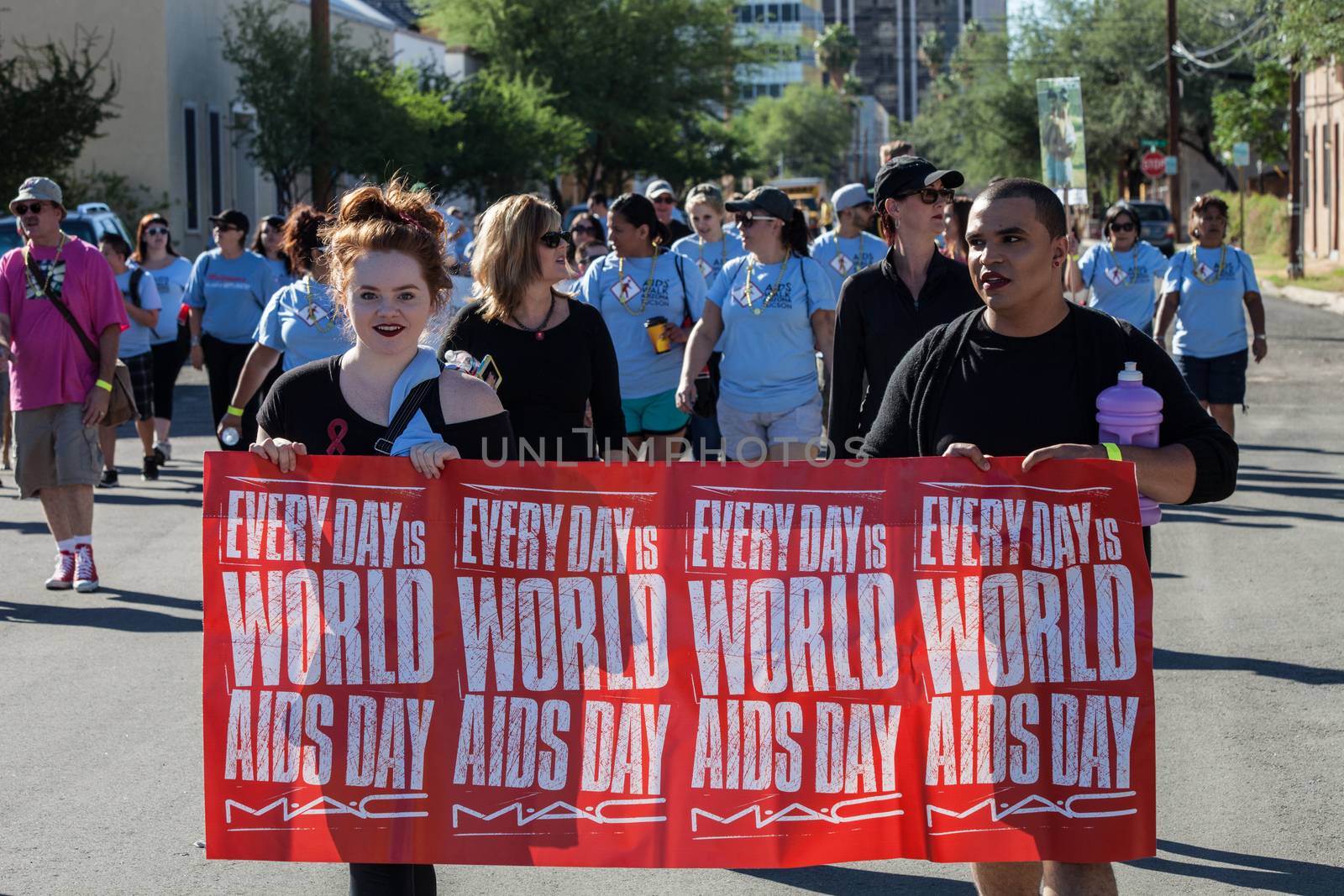 TUCSON, AZ/USA - OCTOBER 12:  Walker s with World AIDS Day sign at AIDSwalk on October 12, 2014 in Tucson, Arizona, USA.