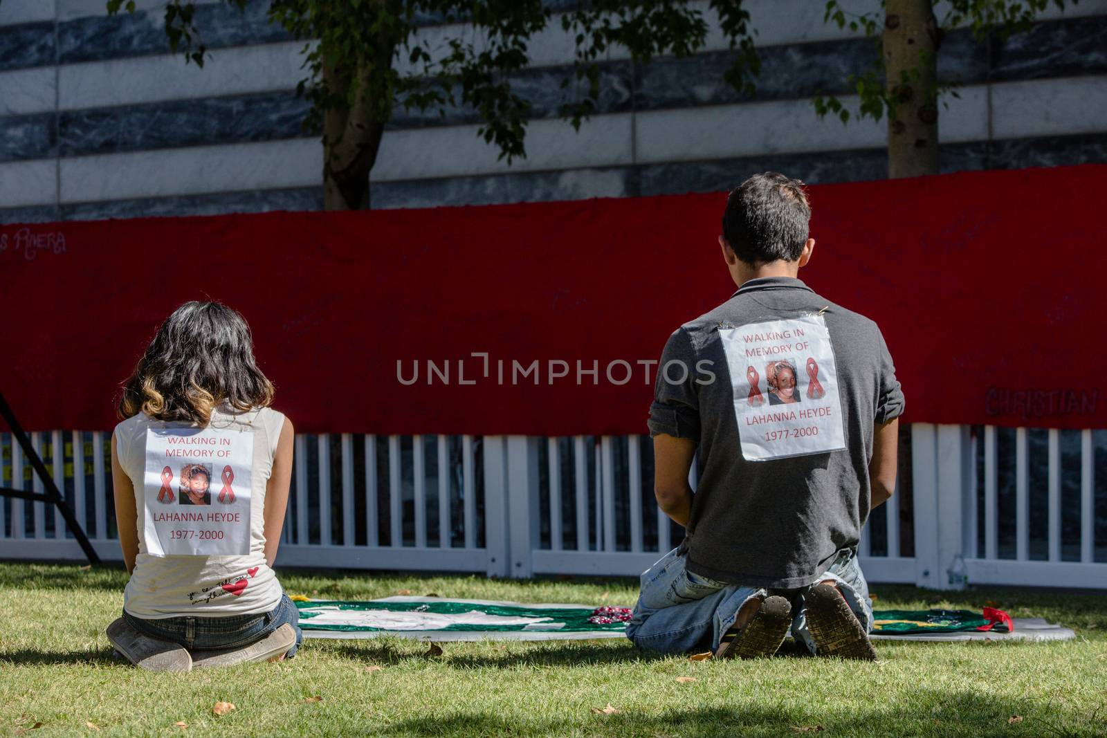 Two Young People at View Section of AIDS Quilt by Creatista