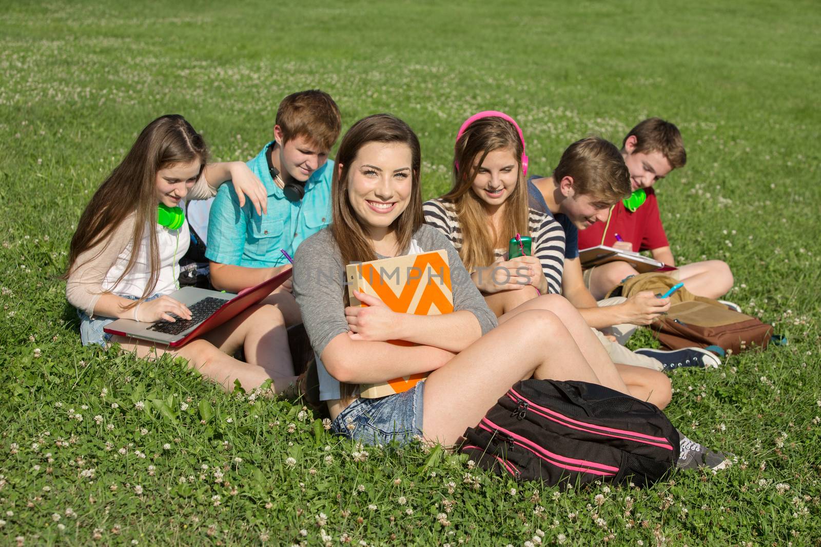 Six Teens Studying Outdoors by Creatista