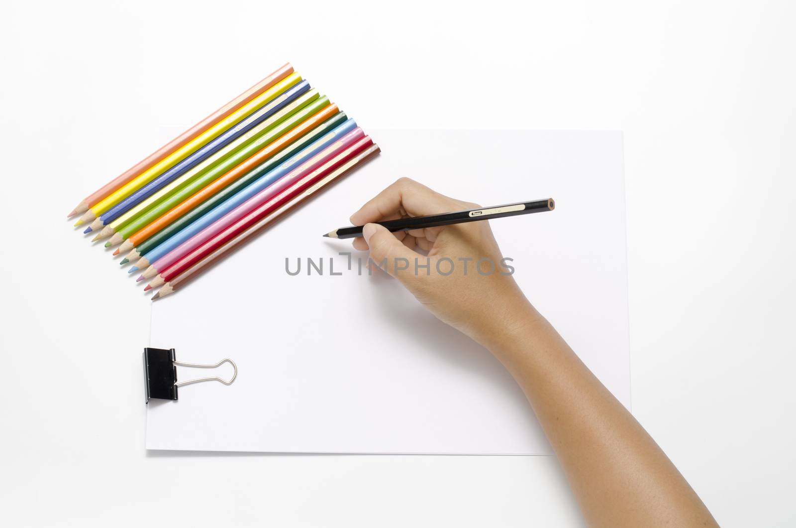 asia woman right hand with black pencil and left hand with colorful pencil on blank white paper over white background