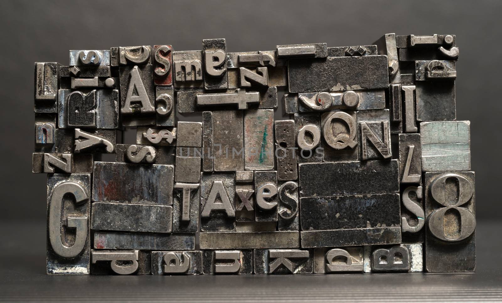 Old metal blank printing press typeset all stacked up