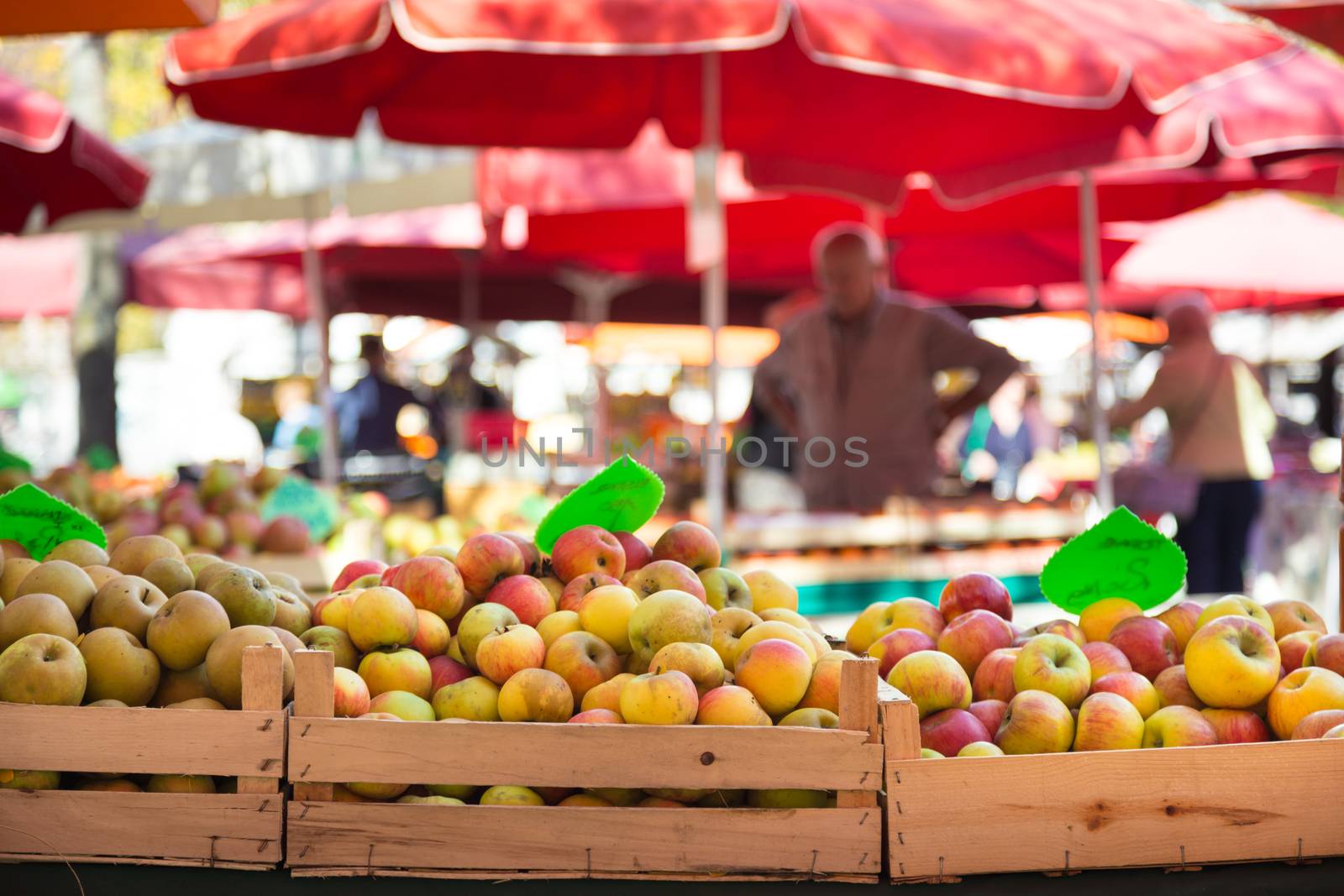 Market stall with organic apples.