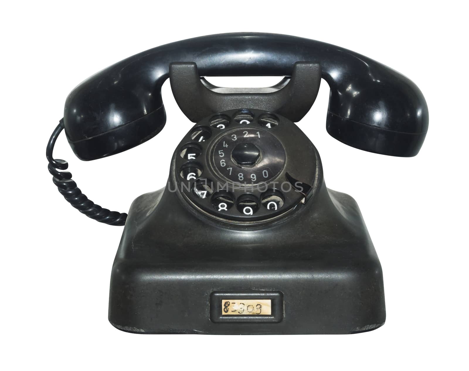Old antique black phone, isolated by f/2sumicron