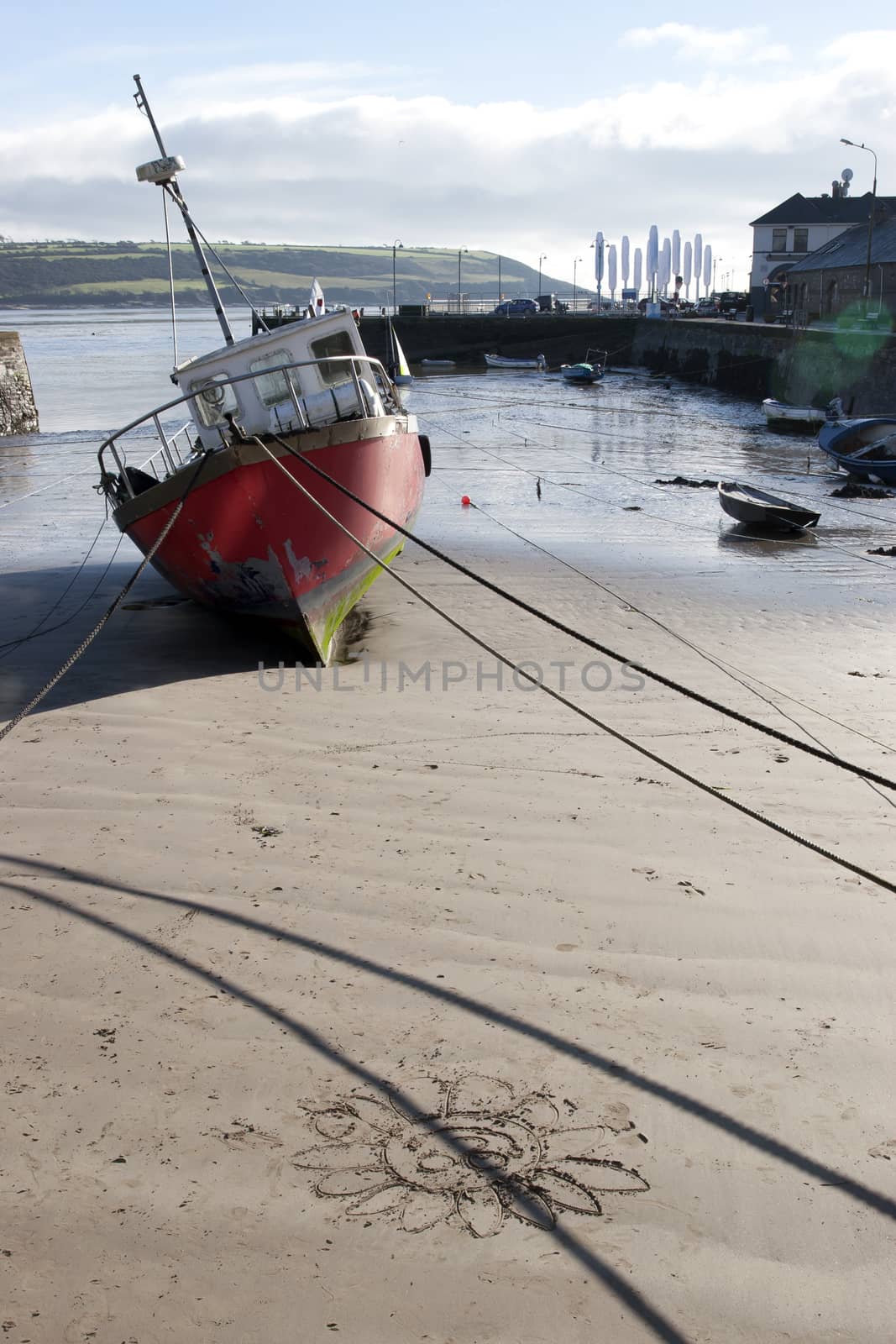 fishing boats moored in the bay of Youghal county Cork, Ireland