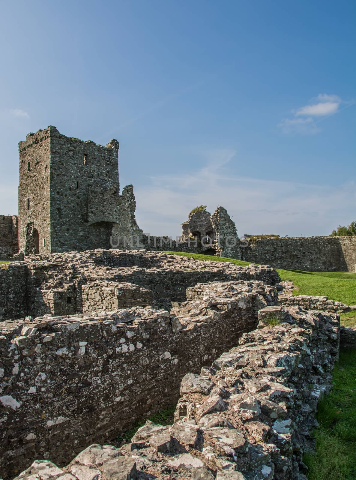 A ruined castle, in South West Wales