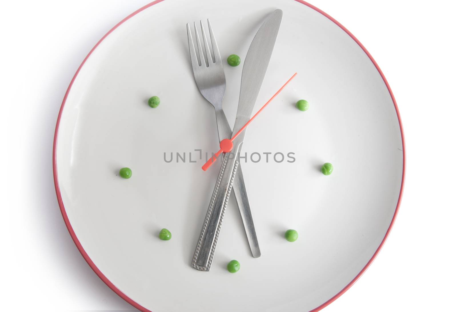 Plate in the form of a clock using cutlery 