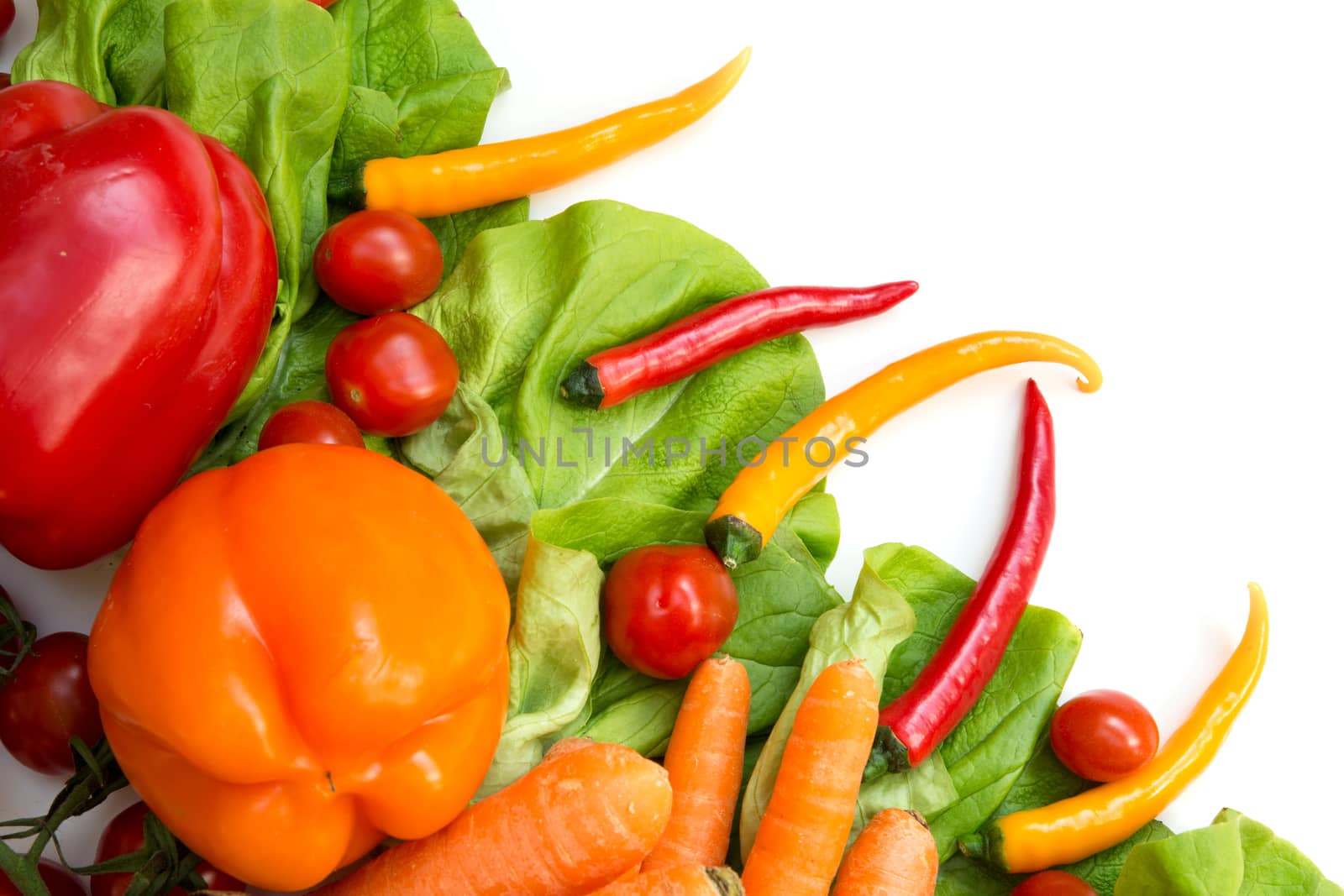 Various vegetables as a background isolated on white.