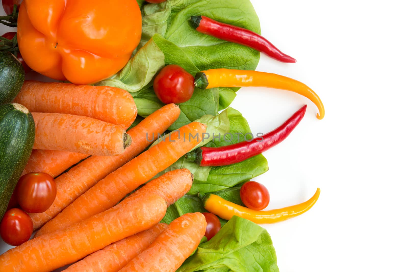 Various vegetables as a background isolated on white.