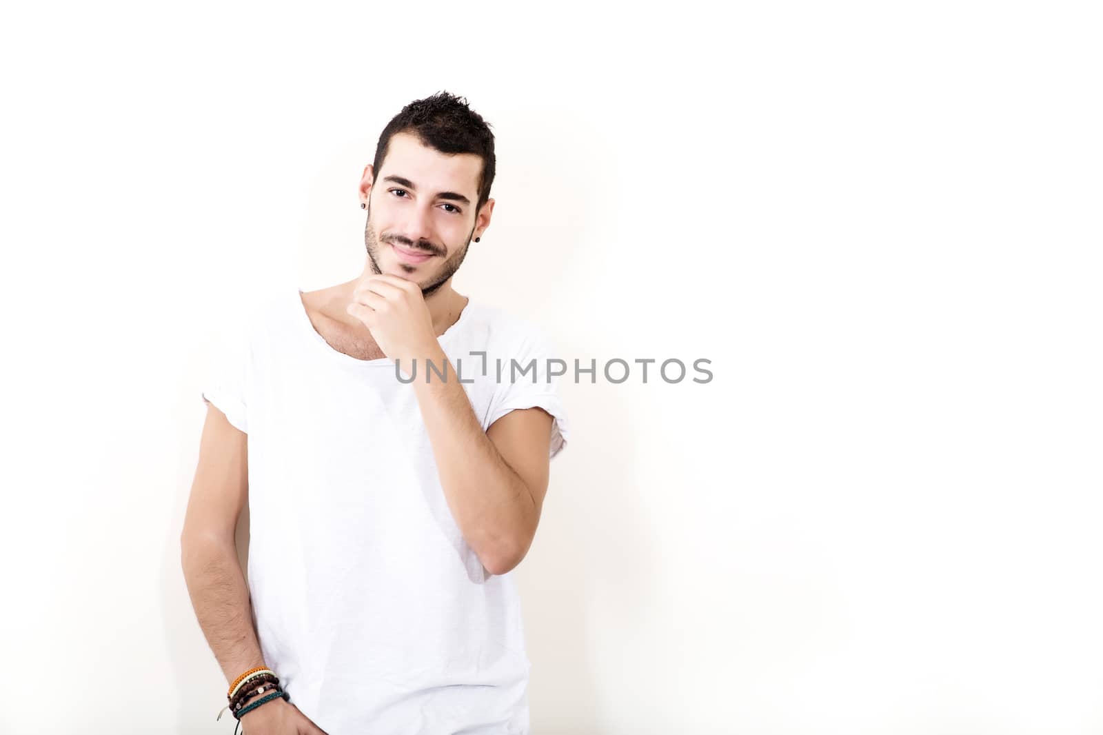 Portrait of a relaxed latin man in casual cloth.