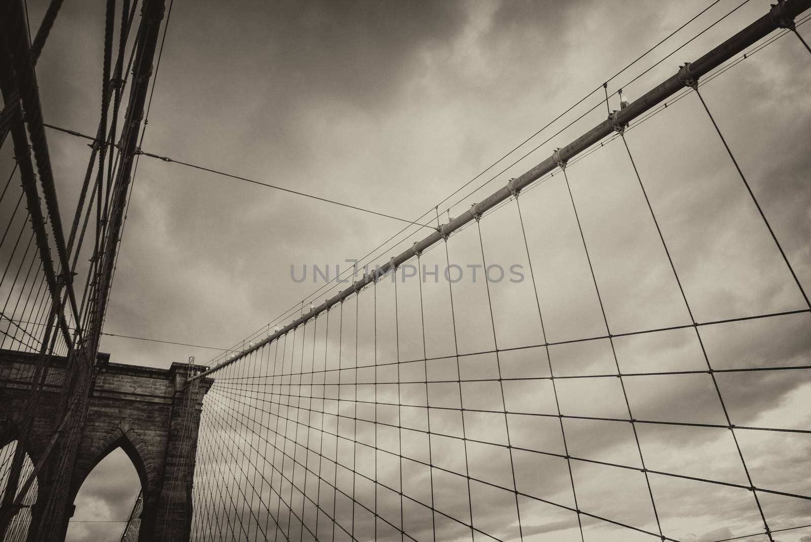 The Brooklyn Bridge. Close-up of Pylon and cables at summer suns by jovannig