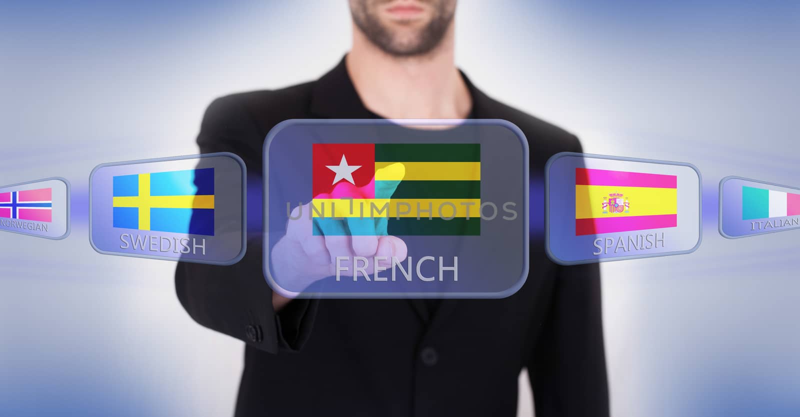 Hand pushing on a touch screen interface, choosing language or country, Togo