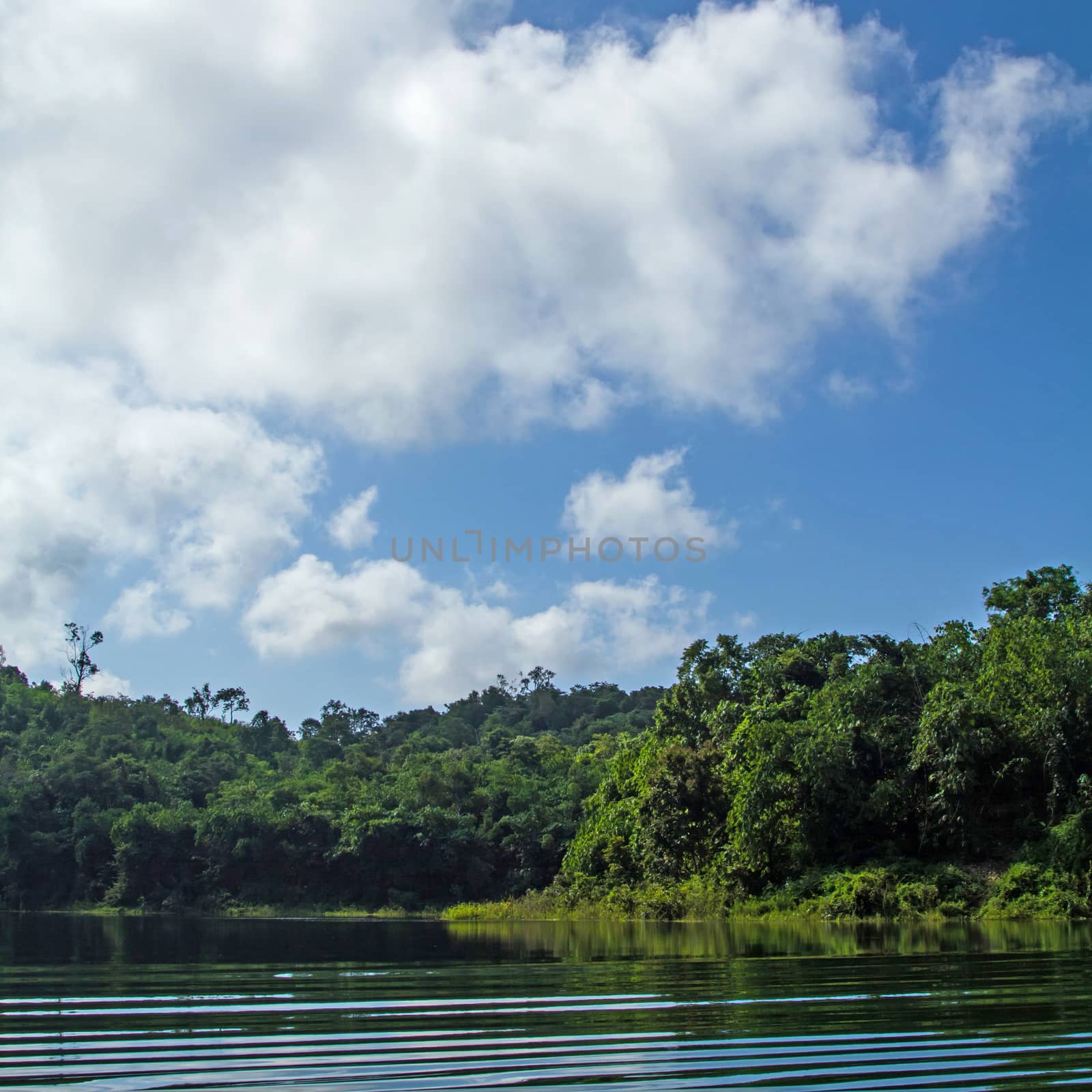 Lake mountain with clouds and blue sky