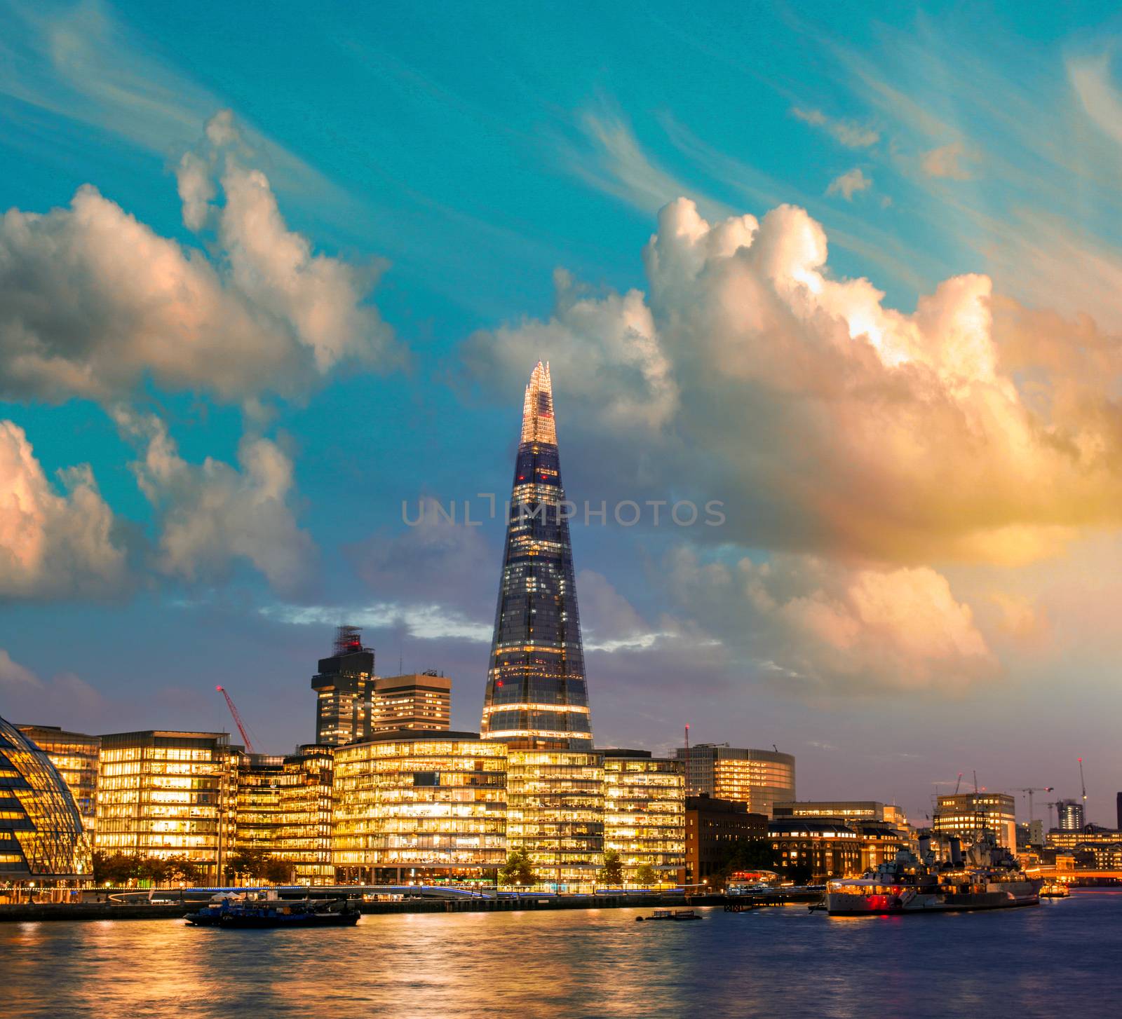 New London city hall at dusk, panoramic view from river. by jovannig
