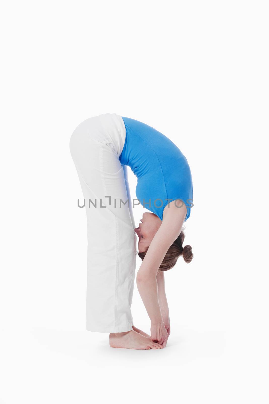 woman exercising hatha yoga - isolated on white