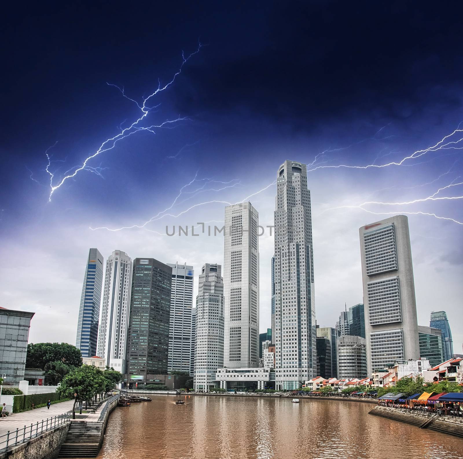 Singapore river and skyline. Beautiful view during a storm by jovannig