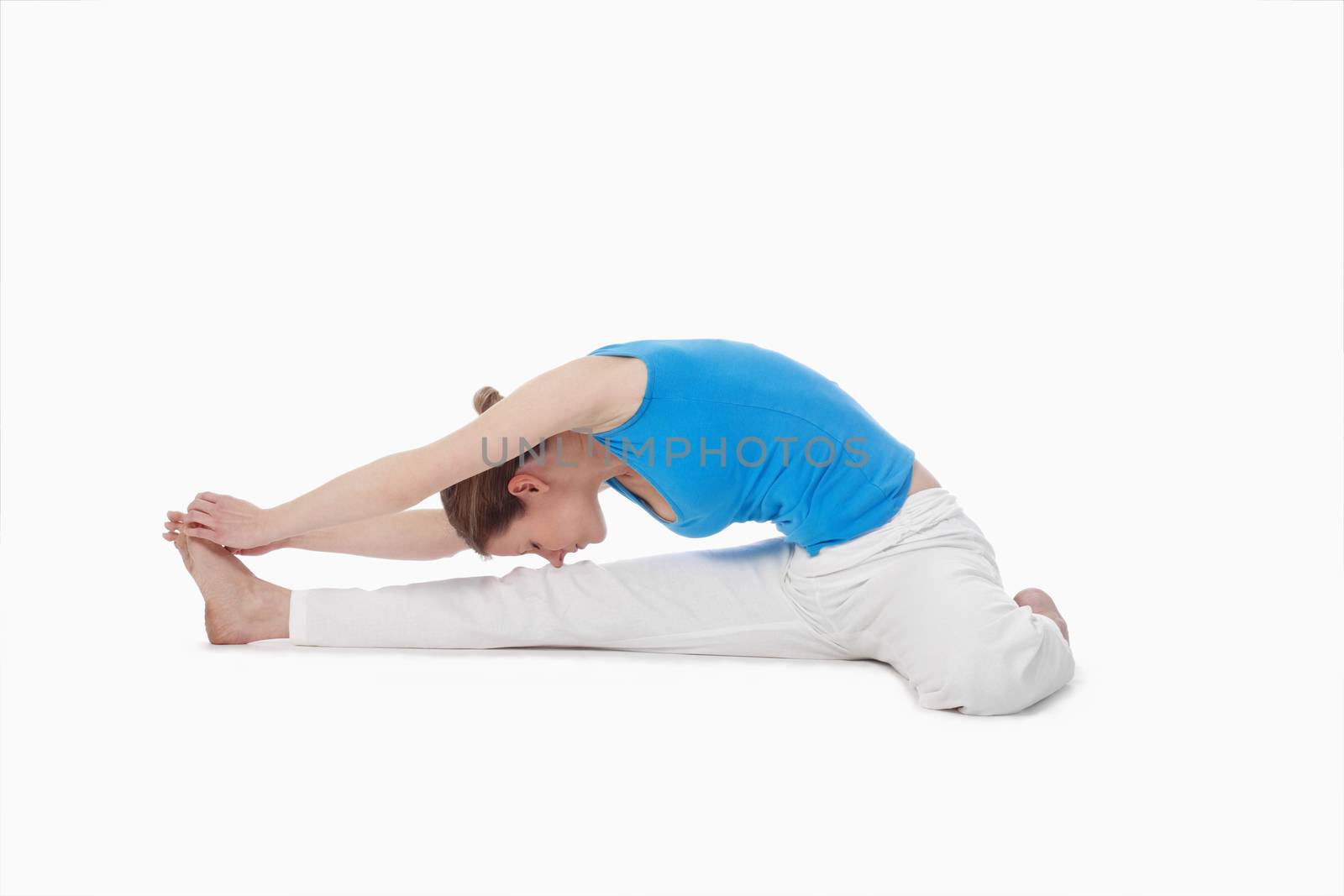 woman exercising hatha yoga - isolated on white