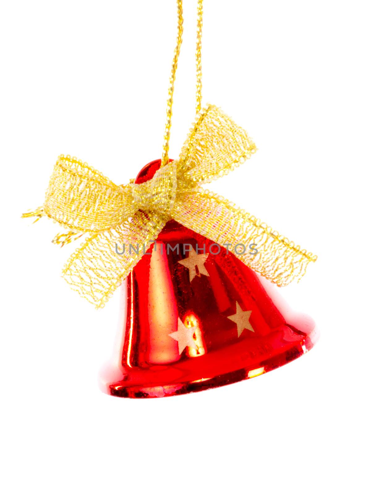 Red bell with golden ribbon brightened