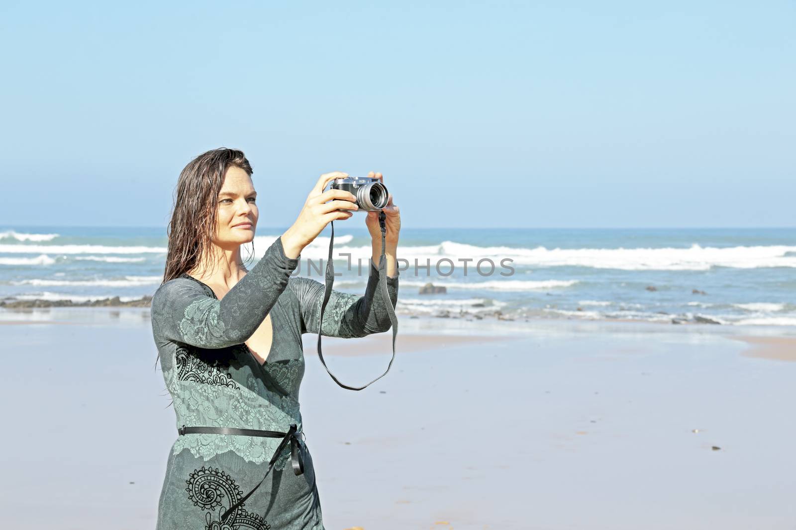 Beautiful woman makes beautiful pictures at the beach in Portugal