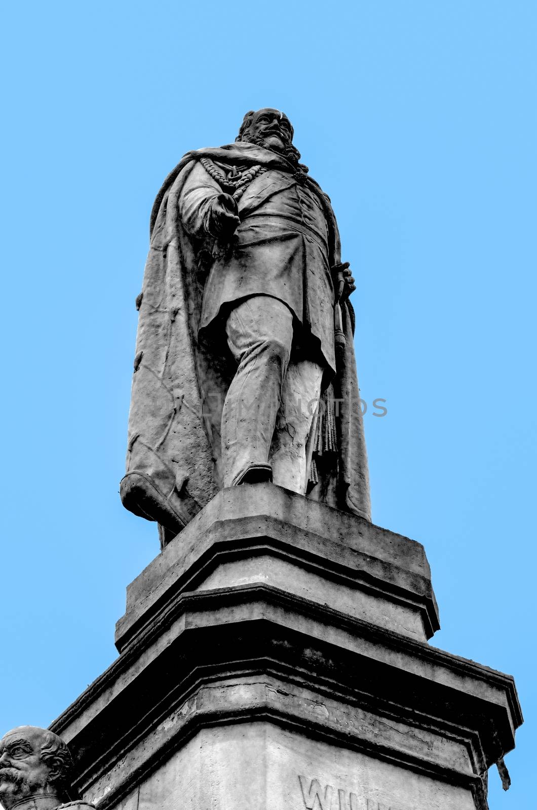 Kaiser wilhelm Memorials on a pedestal in front of a blue sky
