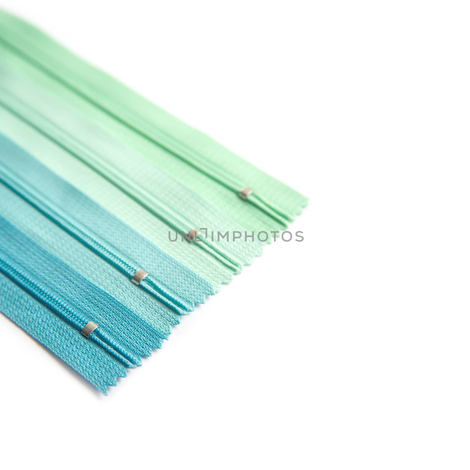 Zipper pastel blue and green end set isolated on white background