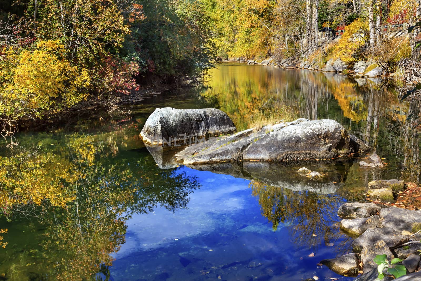 Fall Colors Orange Blue Reflection Wenatchee River Washington by bill_perry