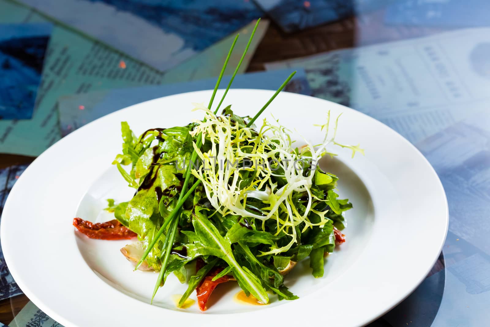 Fresh organic vegetable salad on whte plate.  by sarymsakov