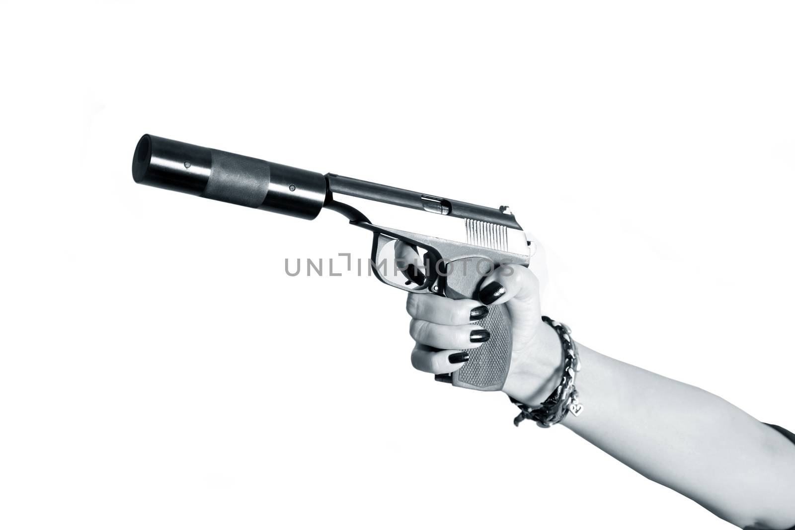 Black pistol in female hand on white a background 