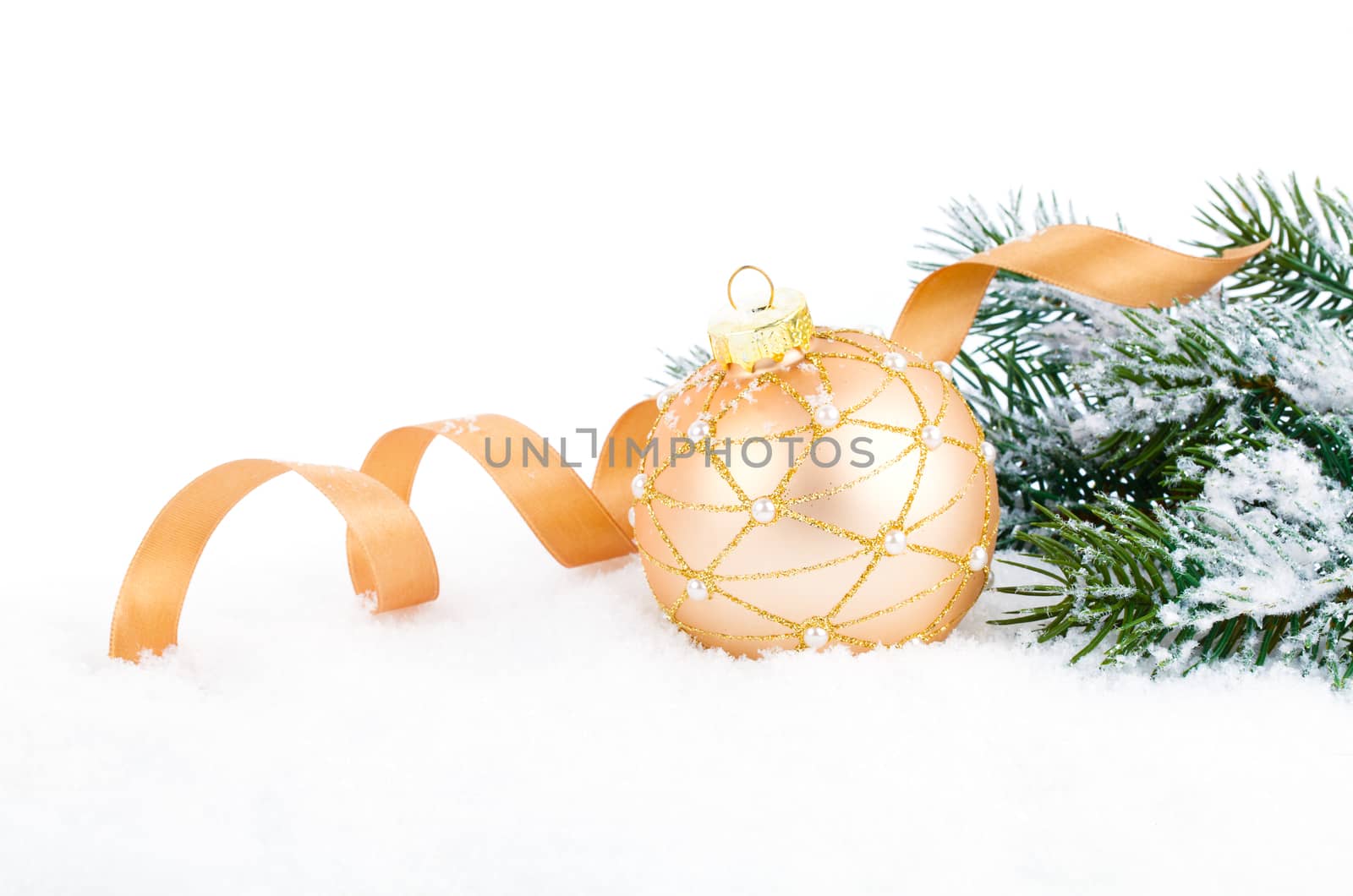 Golden christmas decoration balls with ribbon bow isolated on white background