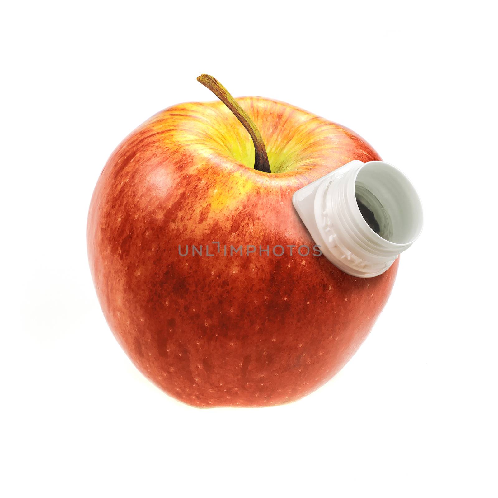 red apple with a hole for drinking juice 