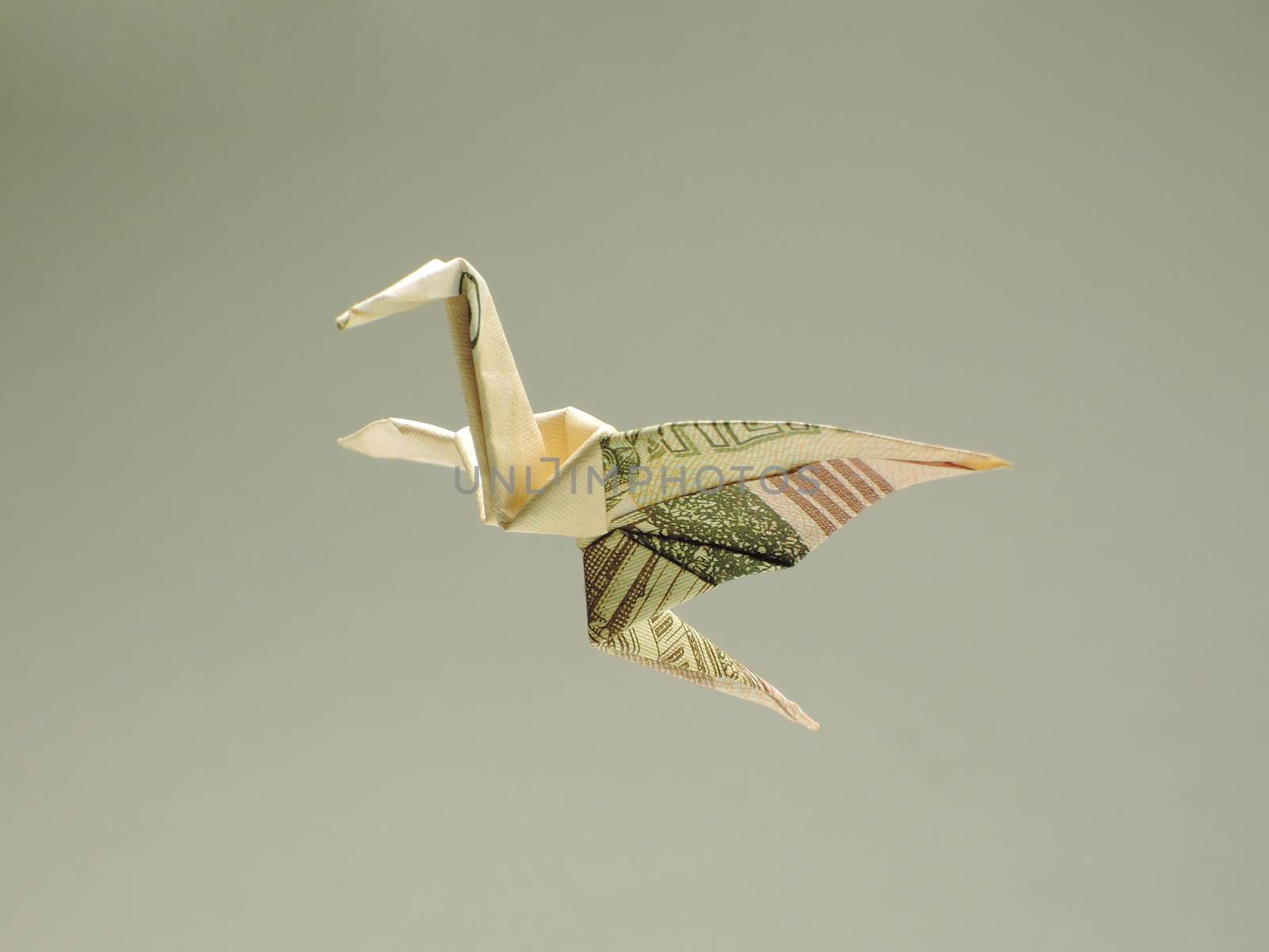 bird origami out of the money in the air