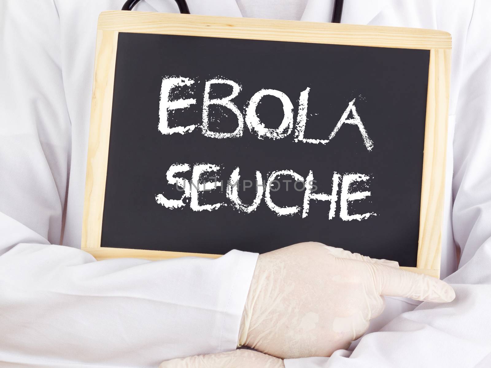 Doctor shows information: Ebola plague in german language