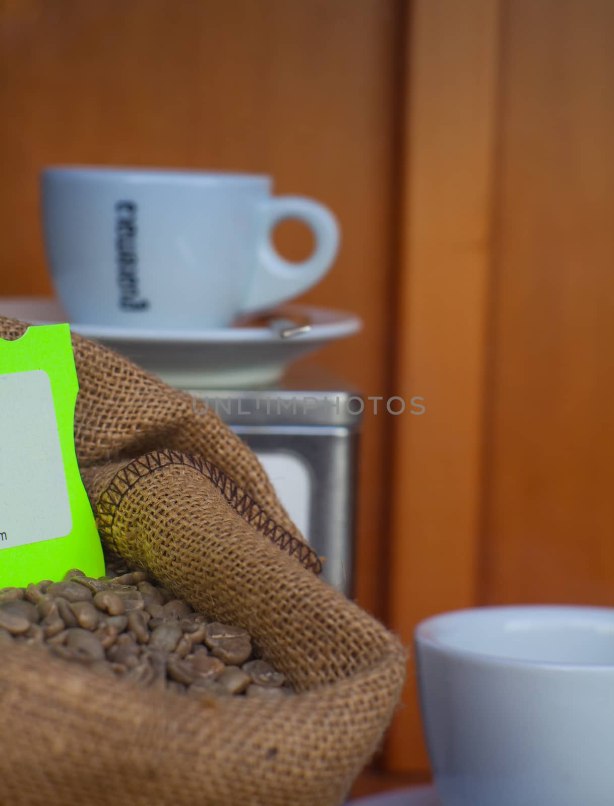 Close up of coffee cup and coffee beans