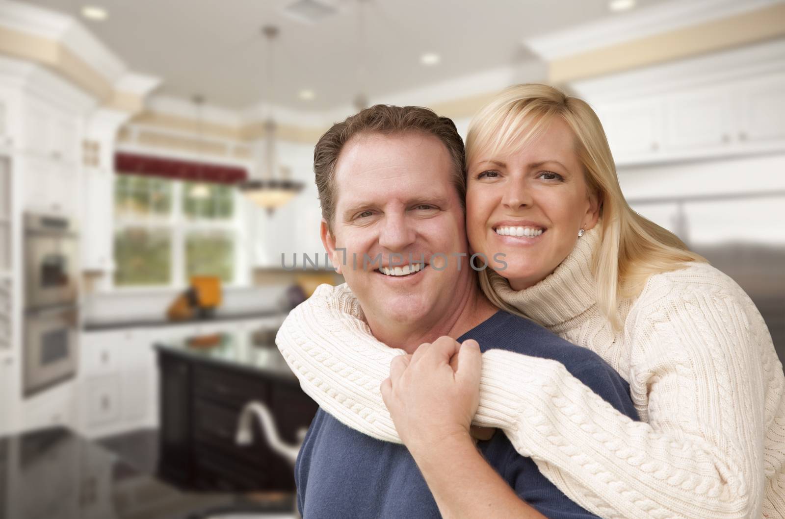 Happy Couple Inside Beautiful Custom Kitchen by Feverpitched