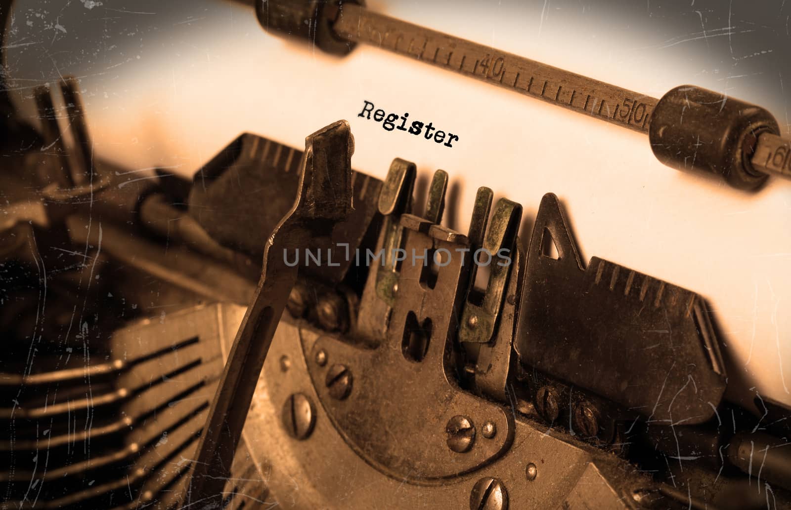Close-up of an old typewriter with paper, selective focus, register
